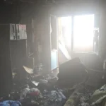 У Херсоні після влучання російського дрона загорілася квартира. ФОТО
